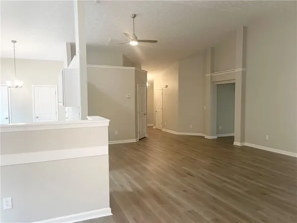 a kitchen with a stove and a microwave