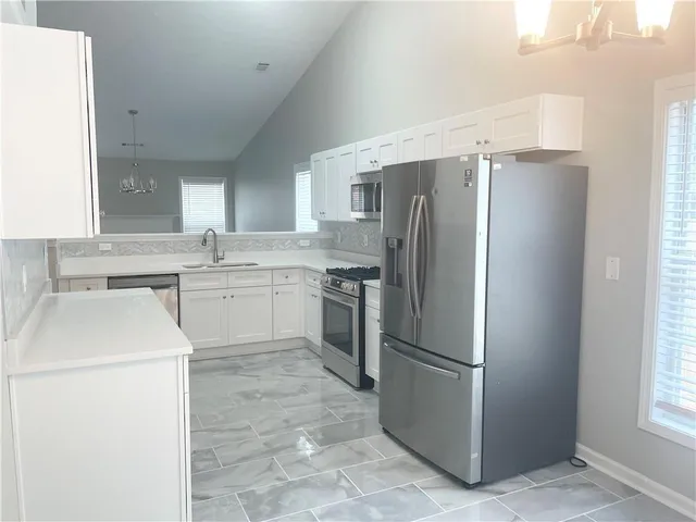 a close view of a sink and mirror