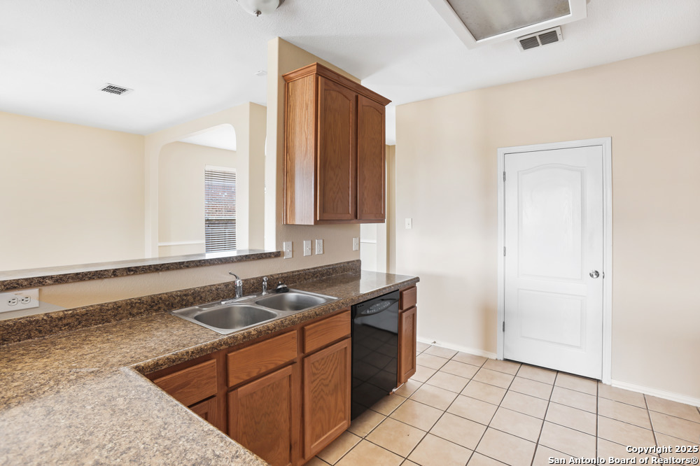 157 Crimson Tree Cibolo, TX 78108 - Photo 12 of 27 a bathroom with a sink a vanity and a mirror