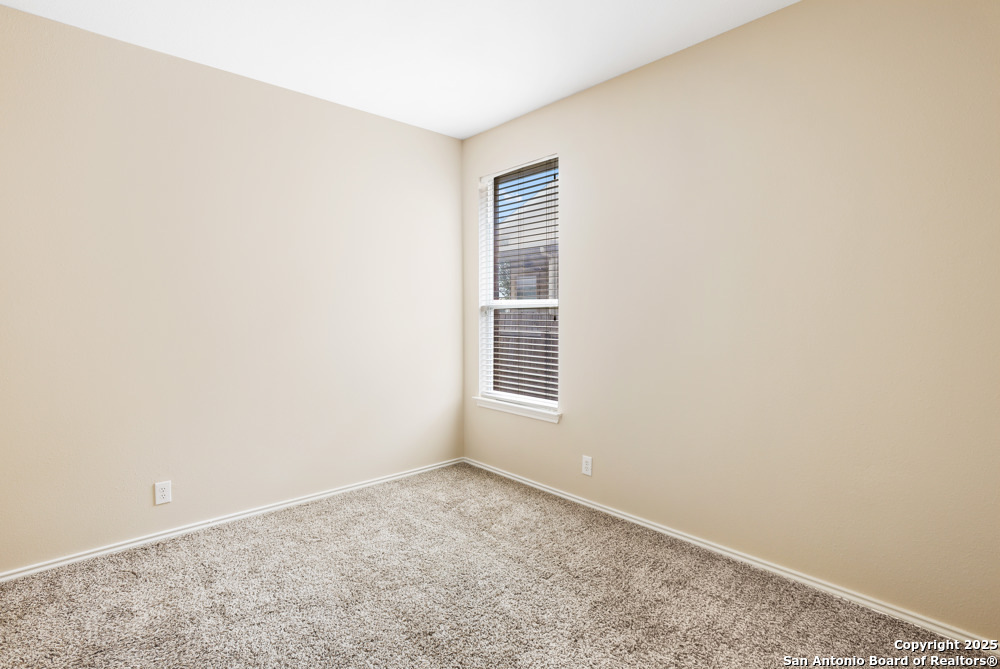 157 Crimson Tree Cibolo, TX 78108 - Photo 19 of 27 an empty room with a window