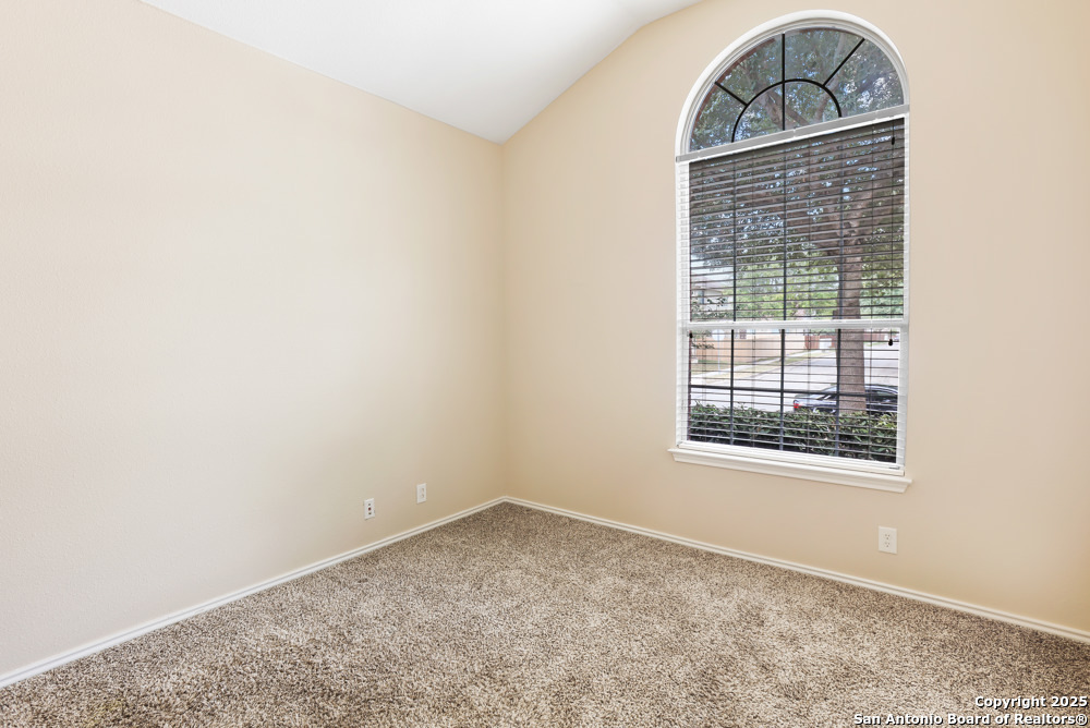 157 Crimson Tree Cibolo, TX 78108 - Photo 21 of 27 an empty room with a window