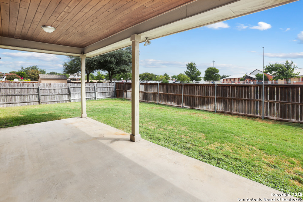 157 Crimson Tree Cibolo, TX 78108 - Photo 24 of 27 a view of a backyard