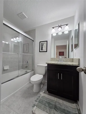 a view of a hallway with washer and dryer