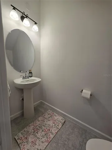 a view of a golf course with a lake