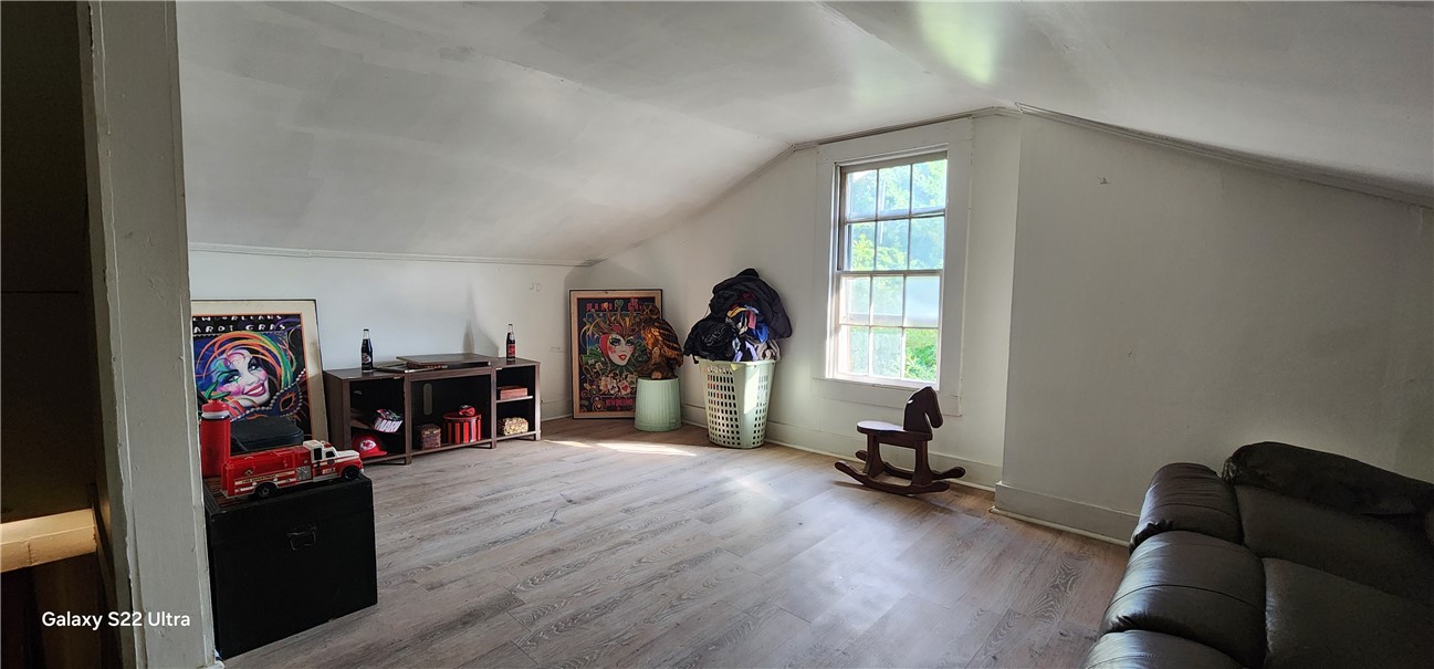 105 Hope Avenue Seneca, SC 29678 - Photo 21 of 33 A versatile attic space provides additional living or storage possibilities with sloped ceilings and durable flooring.