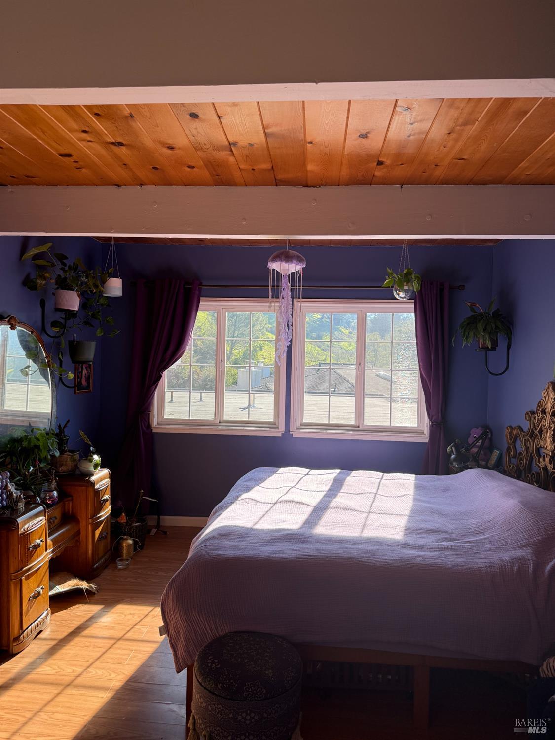 92 Elizabeth Way San Rafael, CA 94901 - Photo 18 of 22 a bed sitting in a bedroom next to a window