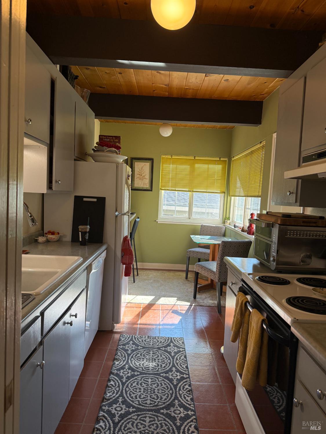 92 Elizabeth Way San Rafael, CA 94901 - Photo 22 of 22 a kitchen with stainless steel appliances granite countertop a sink and a stove