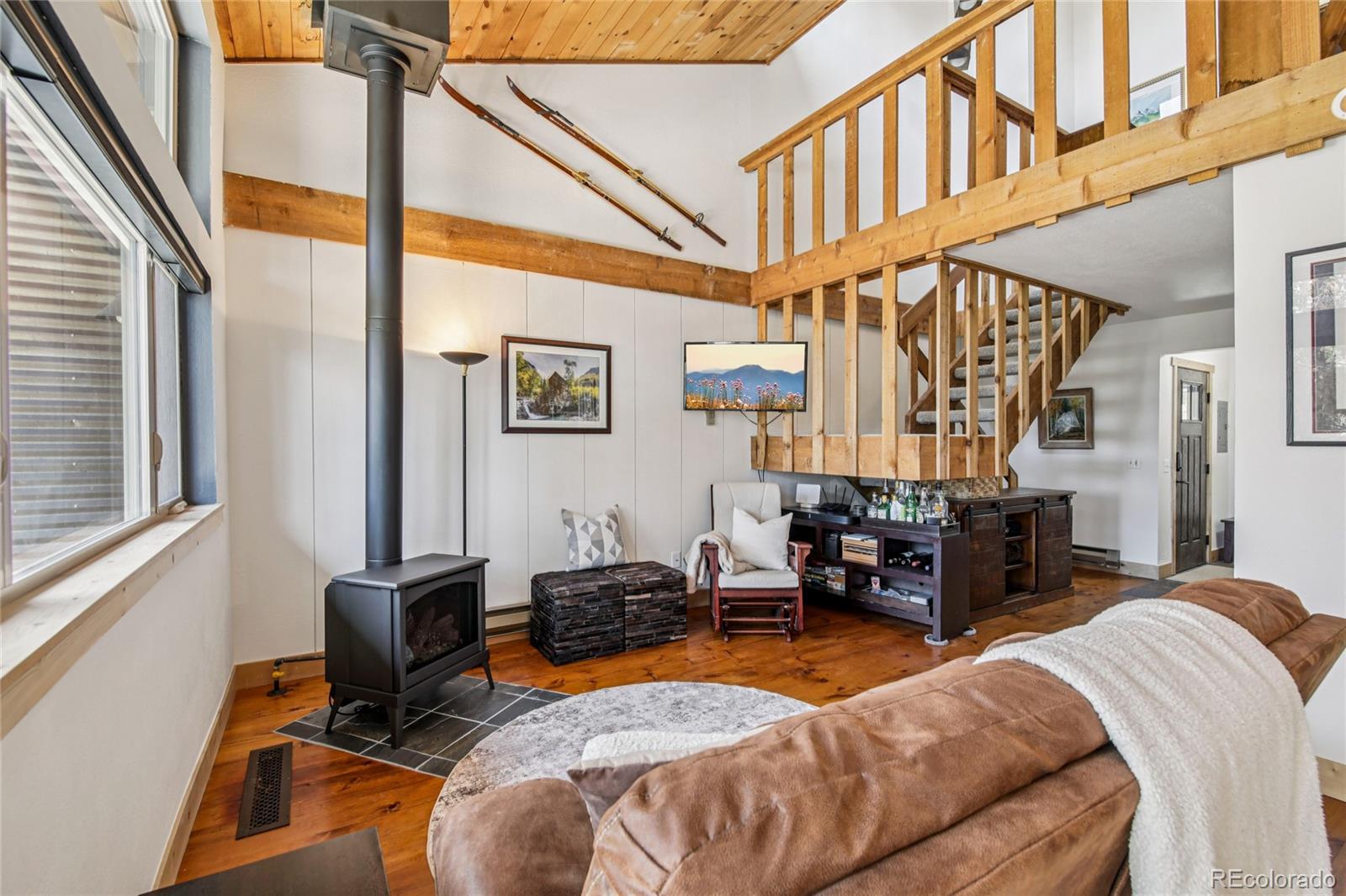 a bedroom with furniture and a window