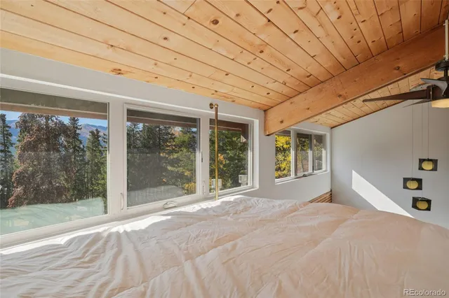 a view of a room with a large window