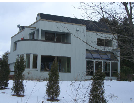 18 Stinson Road Andover, MA 01810 - Photo 1 of 15 a front view of a house with garden