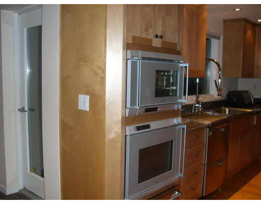 18 Stinson Road Andover, MA 01810 - Photo 12 of 15 a kitchen with a stove and a sink