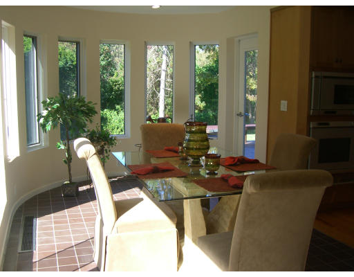 18 Stinson Road Andover, MA 01810 - Photo 13 of 15 a living room with furniture and potted plants