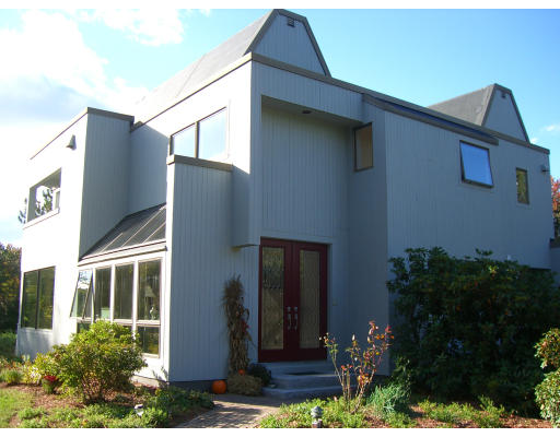 18 Stinson Road Andover, MA 01810 - Photo 3 of 15 a front view of a house with plants