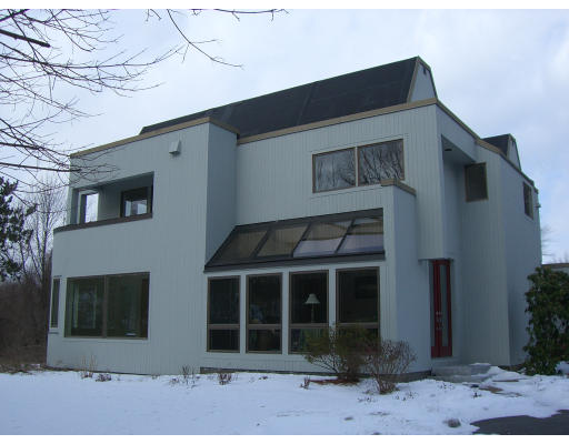 18 Stinson Road Andover, MA 01810 - Photo 5 of 15 a front view of a house with windows