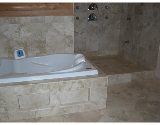 18 Stinson Road Andover, MA 01810 - Photo 8 of 15 a bathroom with a shower