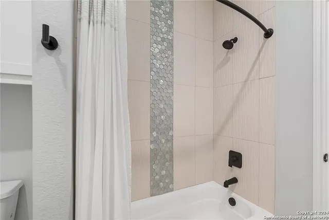 a bathroom with a bathtub