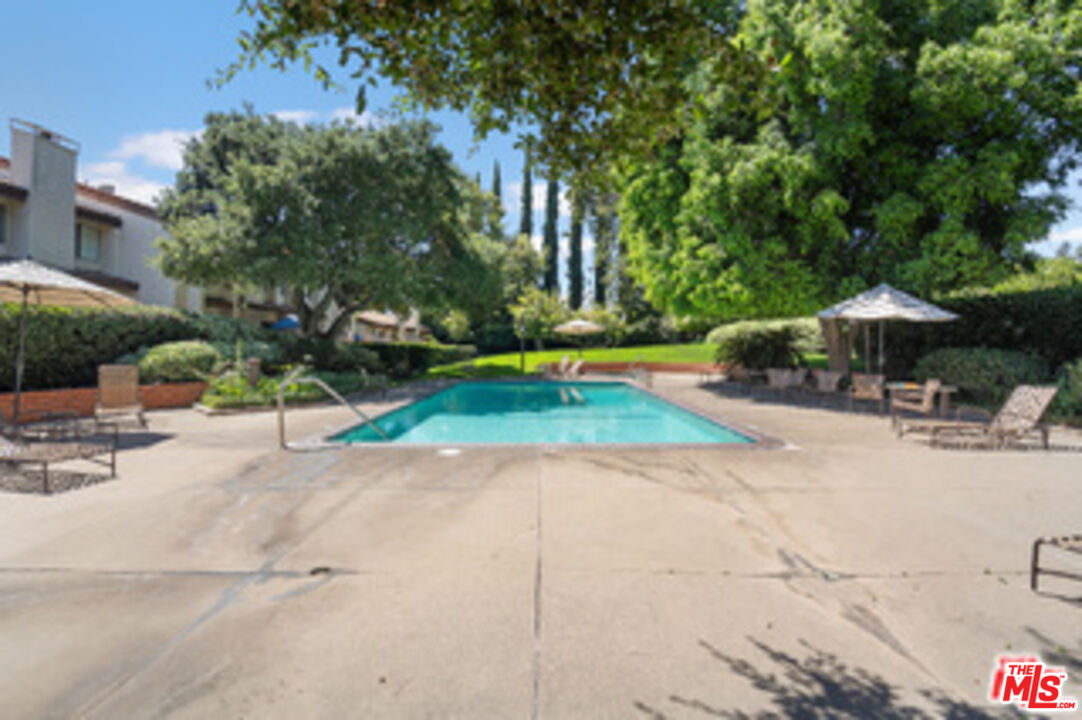 1114 Las Riendas Way Pasadena, CA 91107 - Photo 19 of 20 a view of a swimming pool with sitting area and furniture
