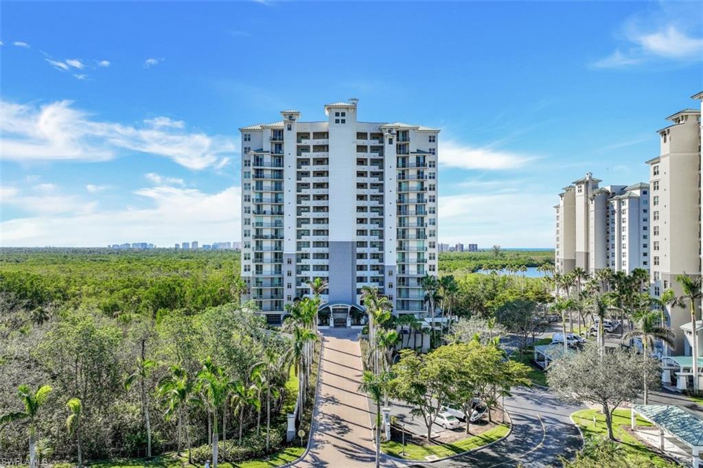 425 Cove Tower Drive, Unit 301 Naples, FL 34110 - Photo 35 of 43 a view of a city with tall buildings