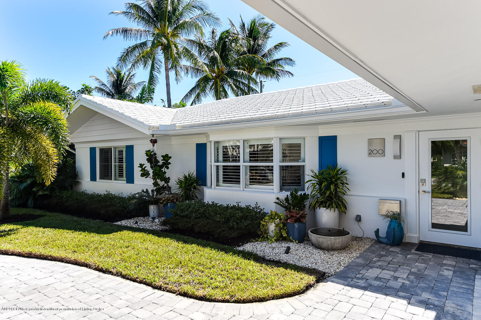 a view of house with outdoor space and garden