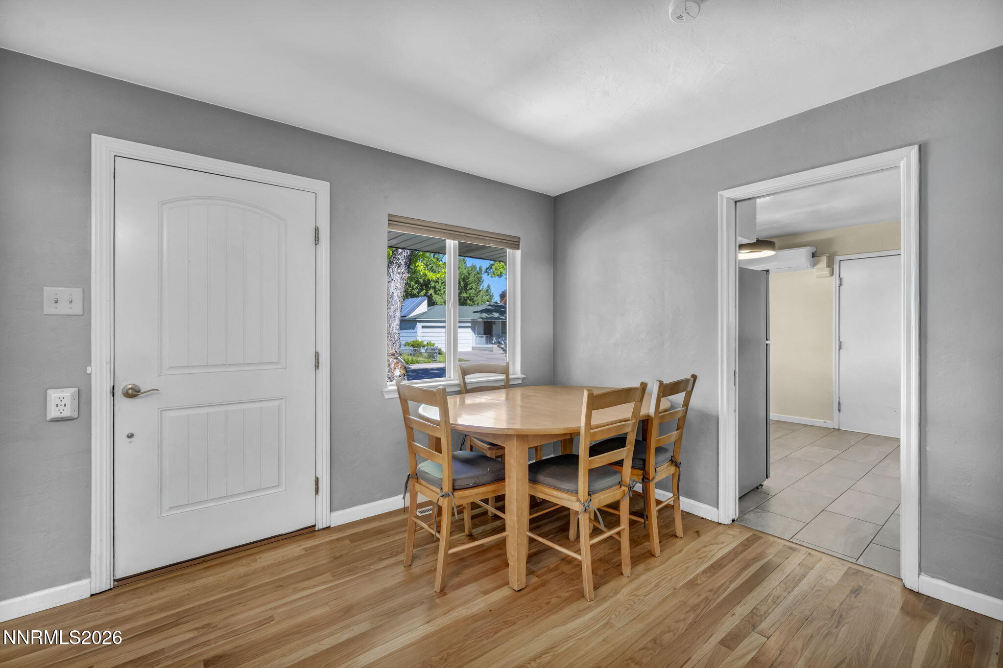 620 Belgrave Avenue Reno, NV 89502 - Photo 11 of 57 a view of a dining room with furniture and wooden floor