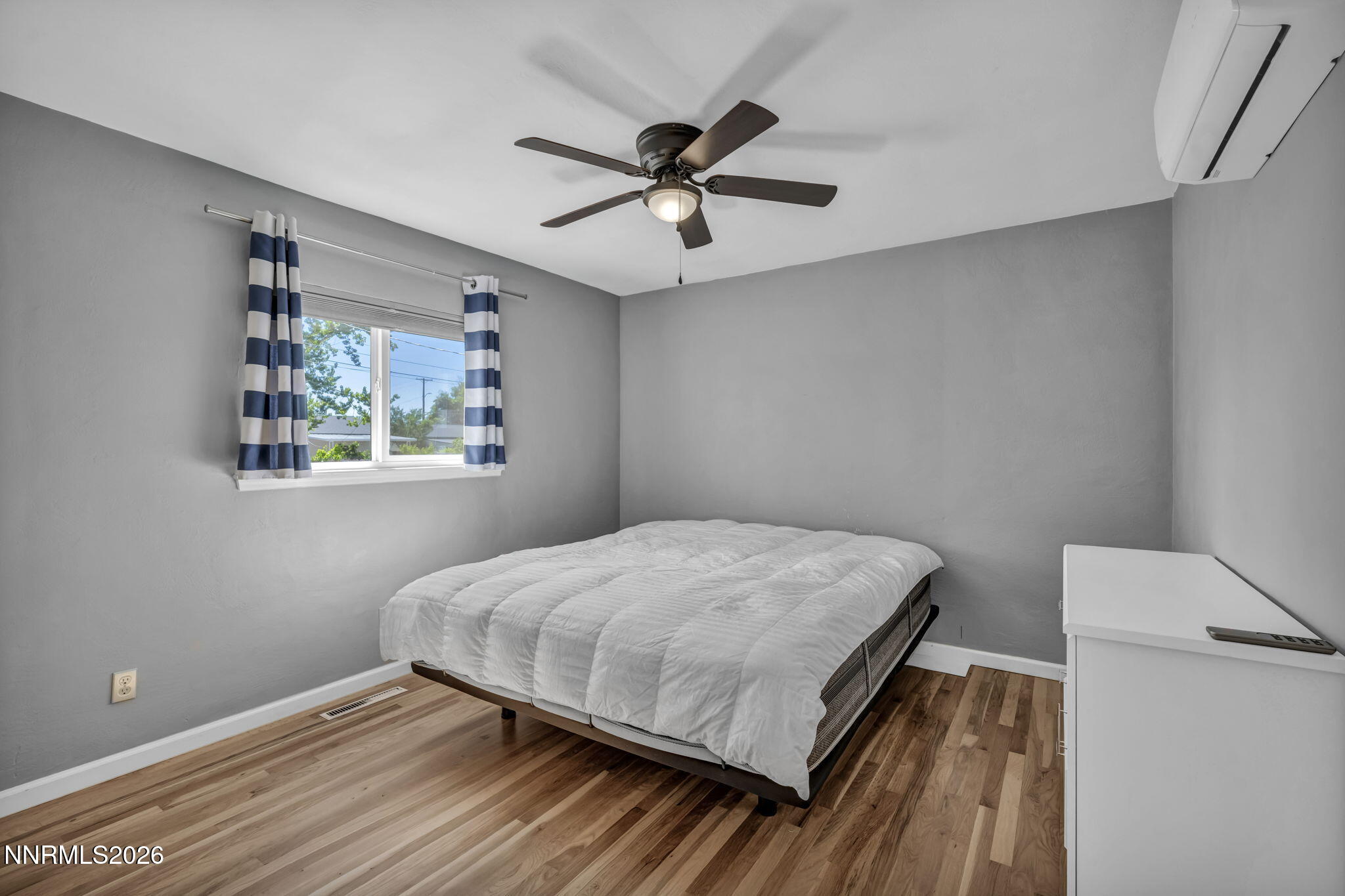 620 Belgrave Avenue Reno, NV 89502 - Photo 21 of 57 a bedroom with a bed and a table