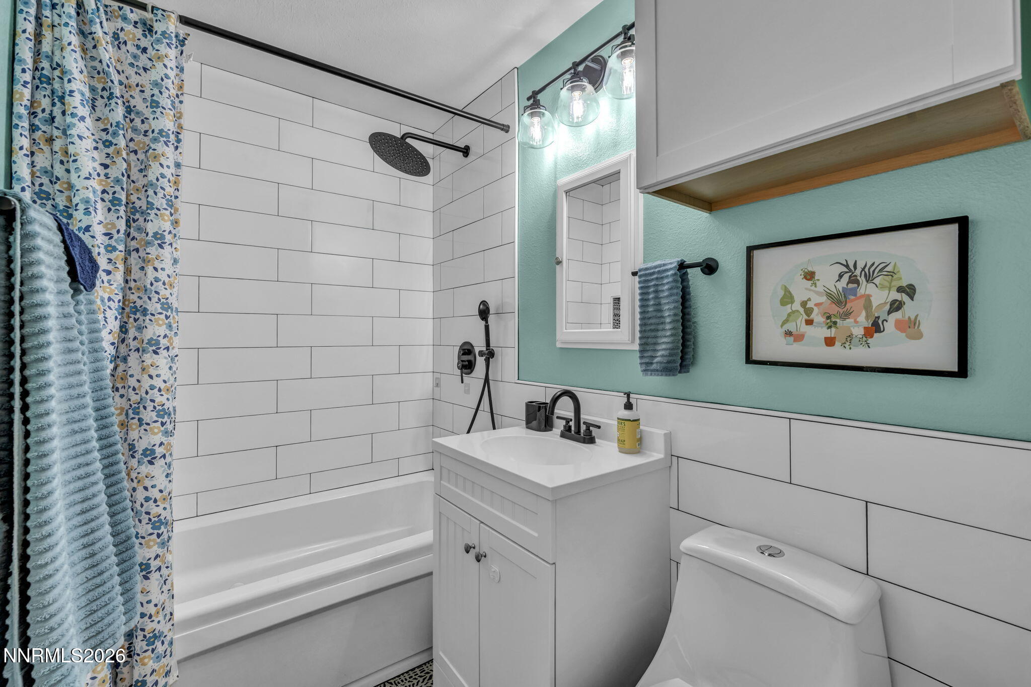 620 Belgrave Avenue Reno, NV 89502 - Photo 24 of 57 a bathroom with a sink a toilet and shower