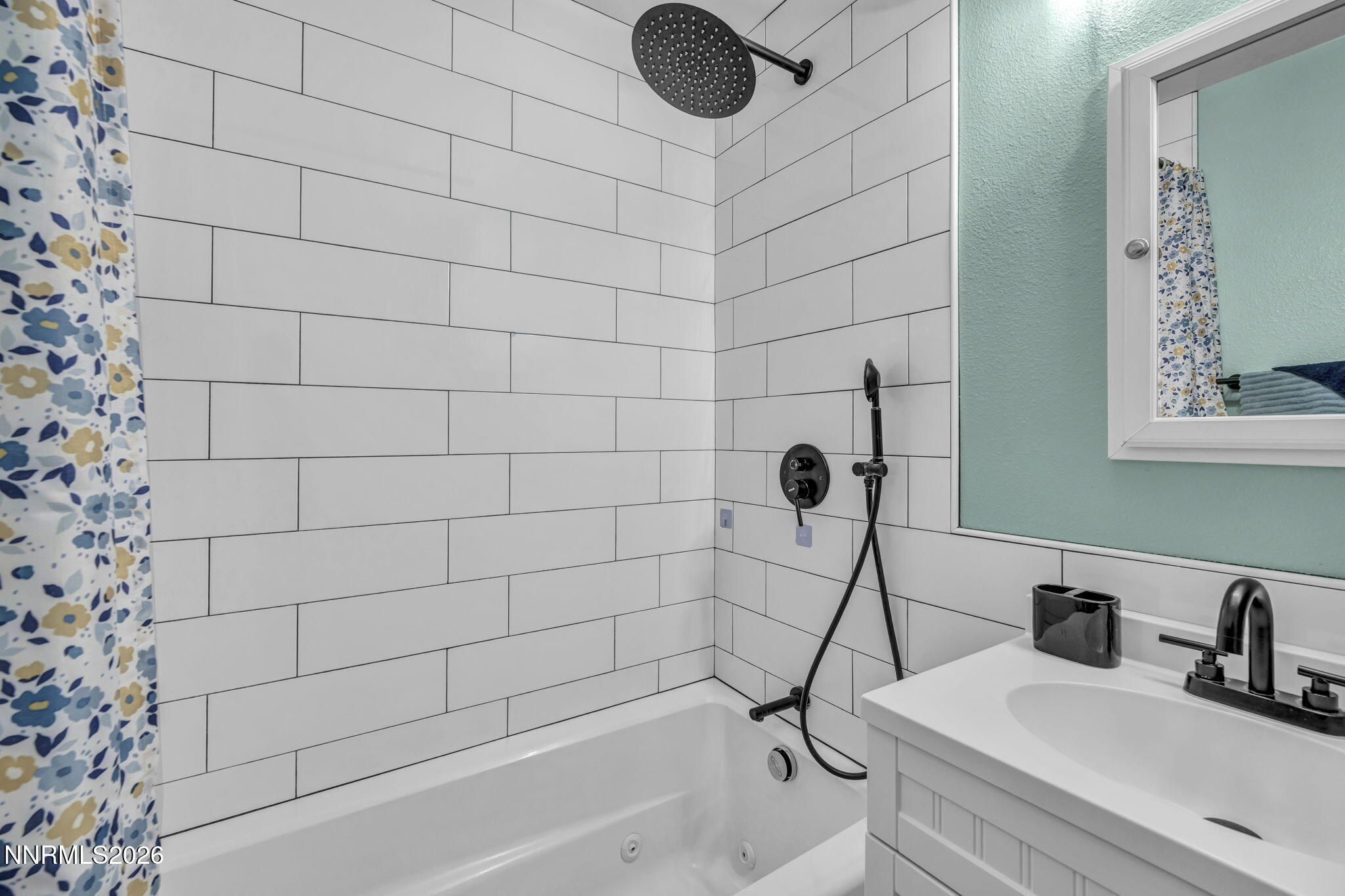 620 Belgrave Avenue Reno, NV 89502 - Photo 25 of 57 a bathroom with a sink and a shower