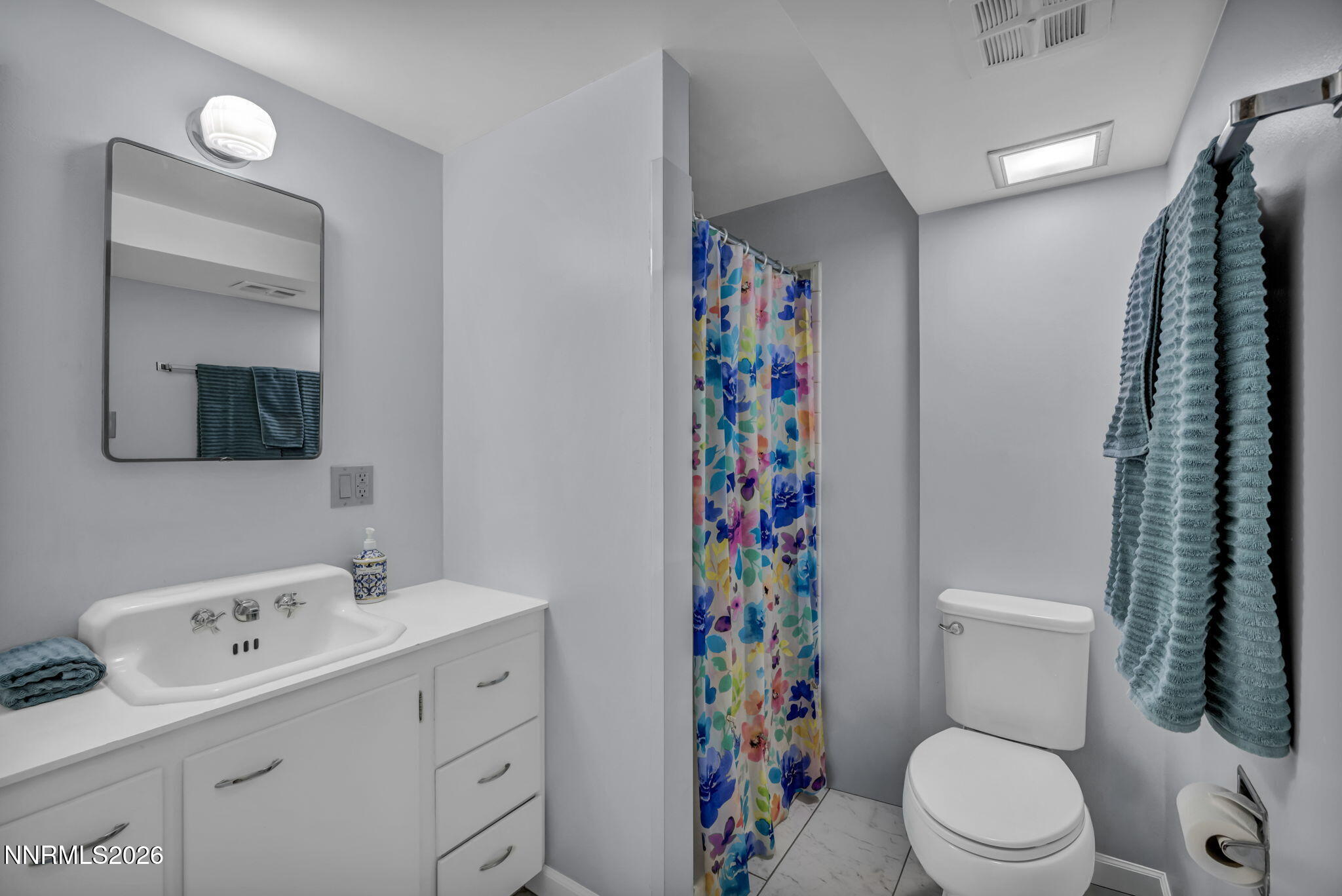 620 Belgrave Avenue Reno, NV 89502 - Photo 26 of 57 a bathroom with a sink toilet and shower