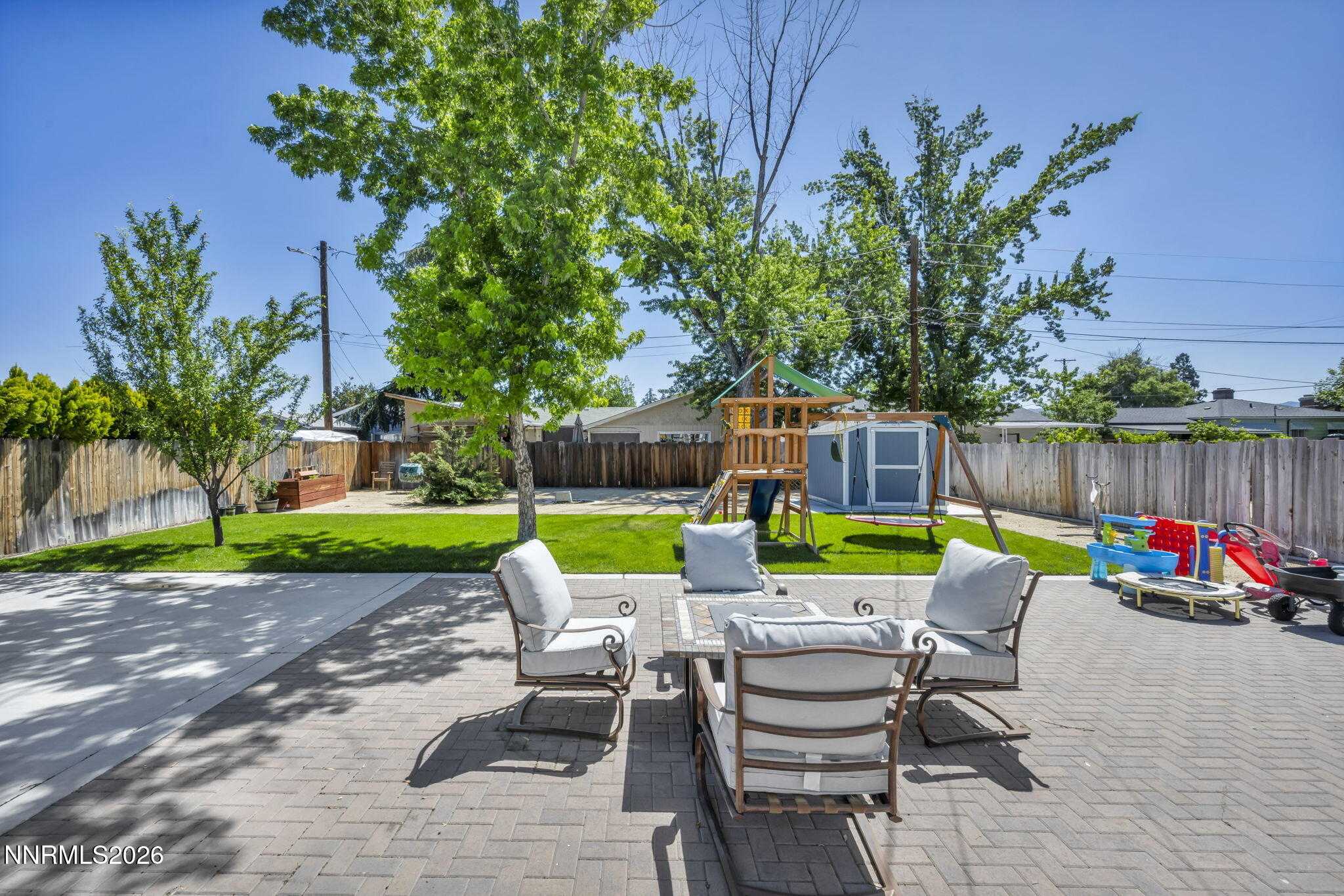 620 Belgrave Avenue Reno, NV 89502 - Photo 39 of 57 a view of backyard with swimming pool and green space