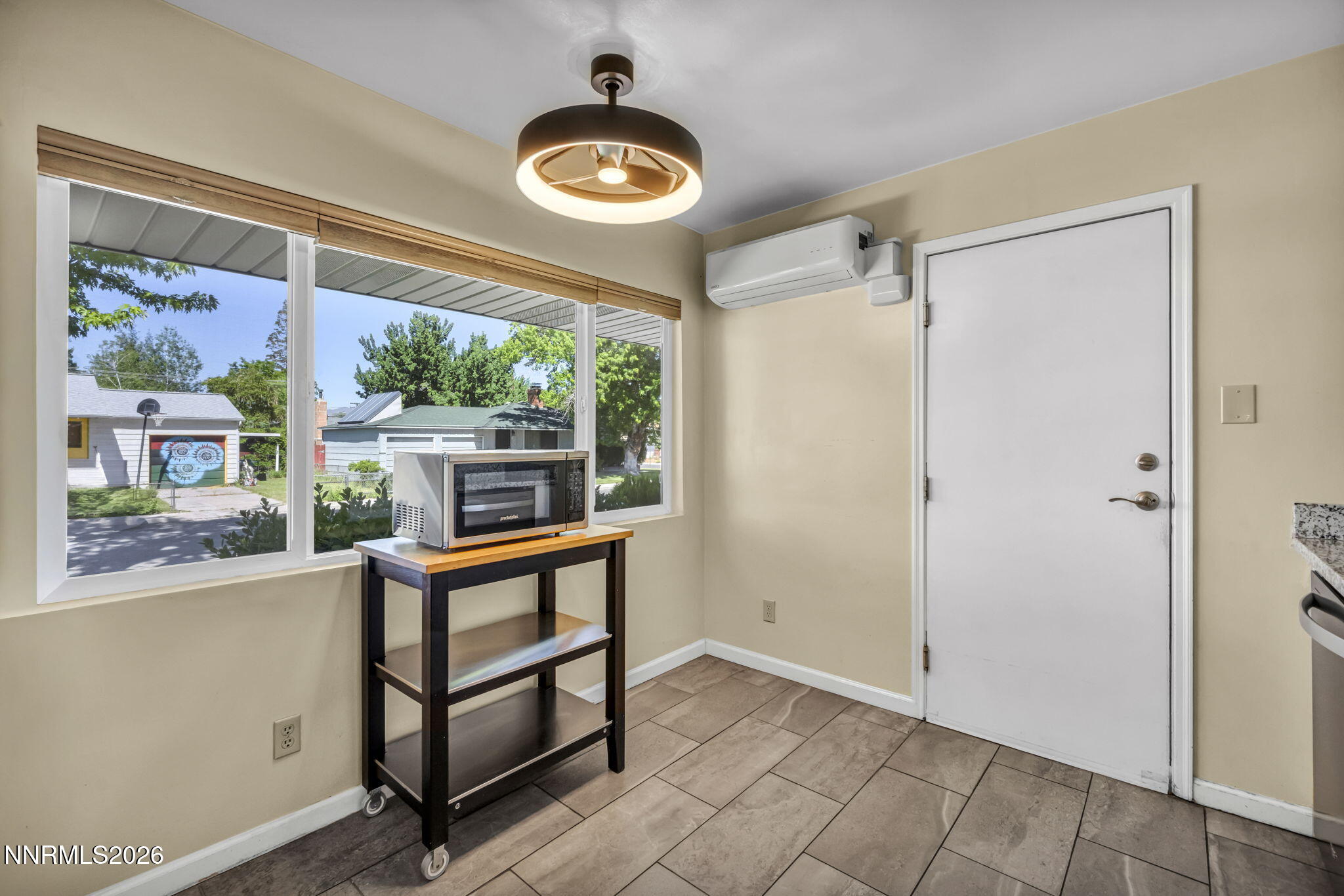 620 Belgrave Avenue Reno, NV 89502 - Photo 4 of 57 wooden floor in an empty room with a window