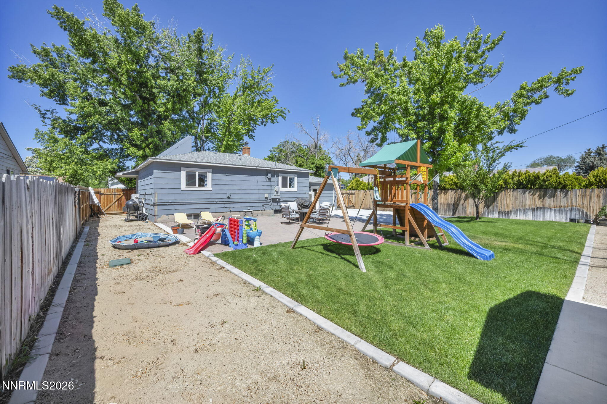 620 Belgrave Avenue Reno, NV 89502 - Photo 45 of 57 a view of a house with a yard and sitting area