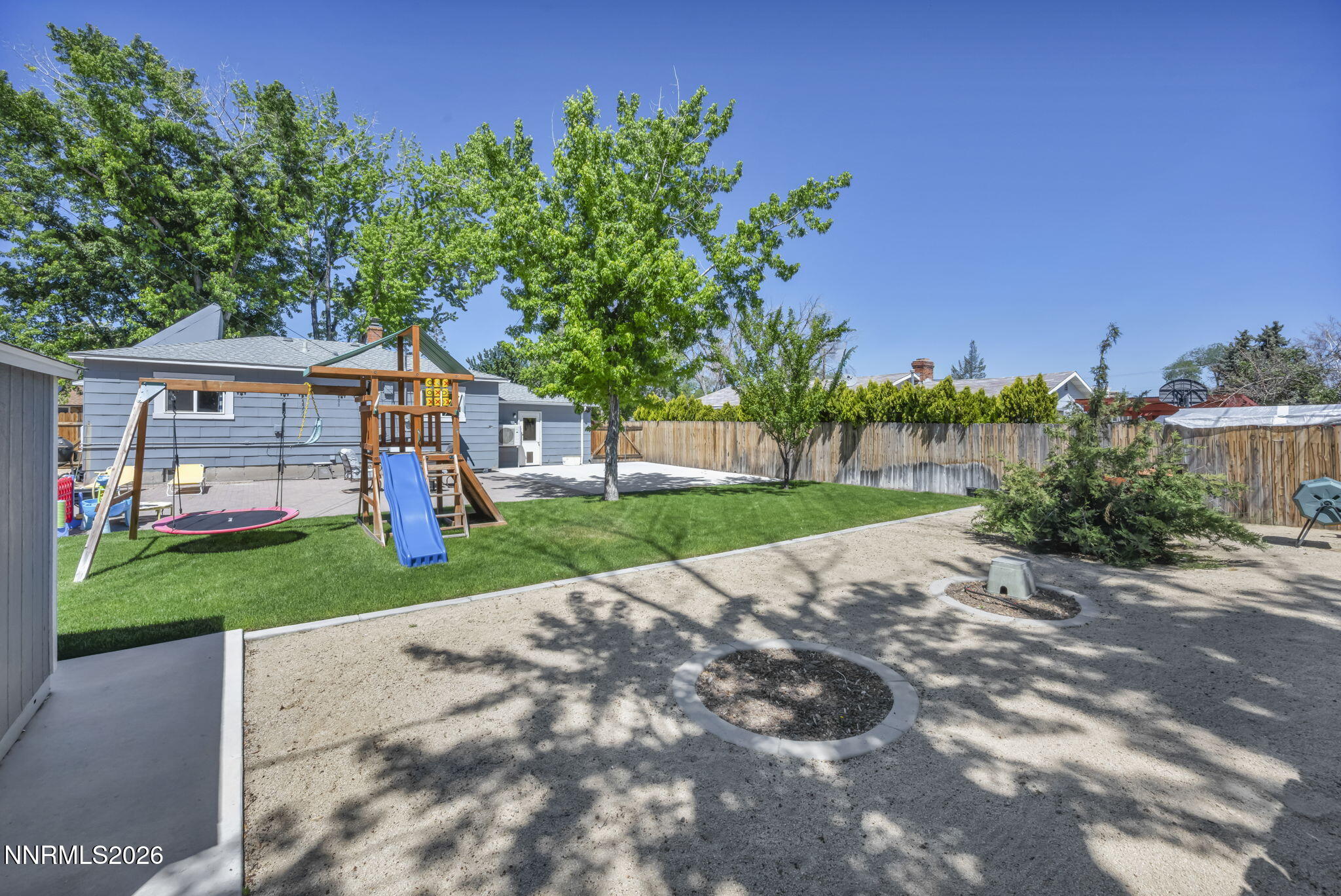 620 Belgrave Avenue Reno, NV 89502 - Photo 46 of 57 a view of a house with a yard and tree s