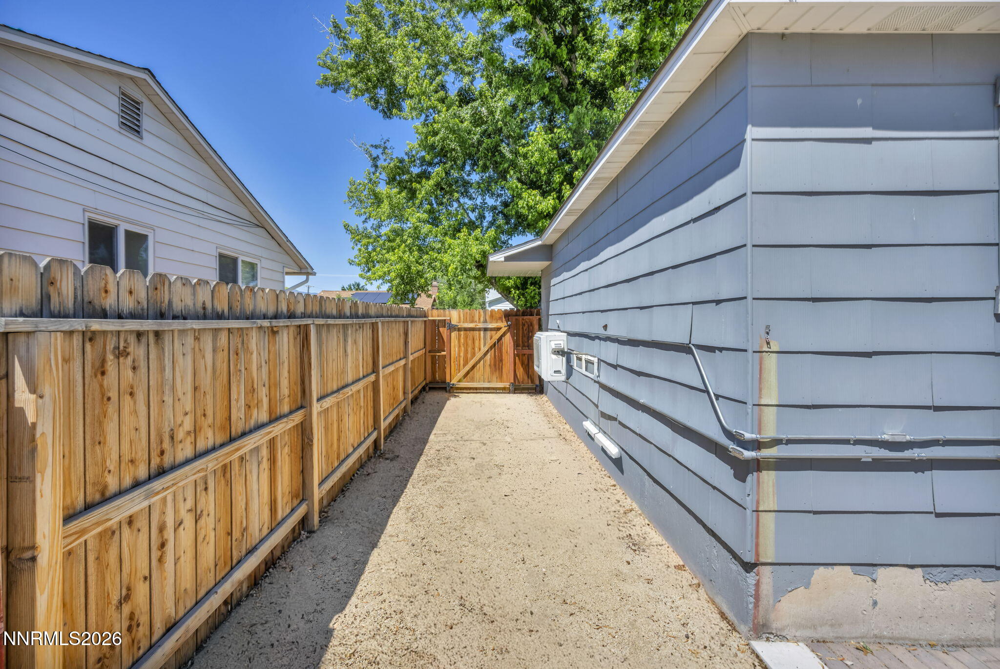 620 Belgrave Avenue Reno, NV 89502 - Photo 54 of 57 a view of backyard with wooden stairs and a potted plant