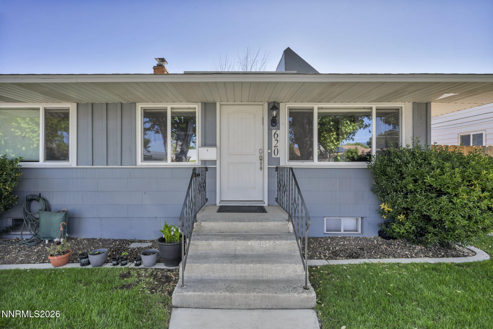 620 Belgrave Avenue Reno, NV 89502 - Photo 56 of 57 a front view of a house with garden