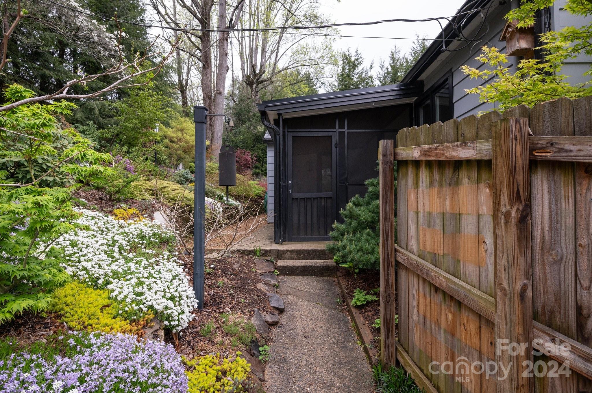 24 Maplewood Road Asheville, NC 28804 - Photo 25 of 38 a house with trees in front of it