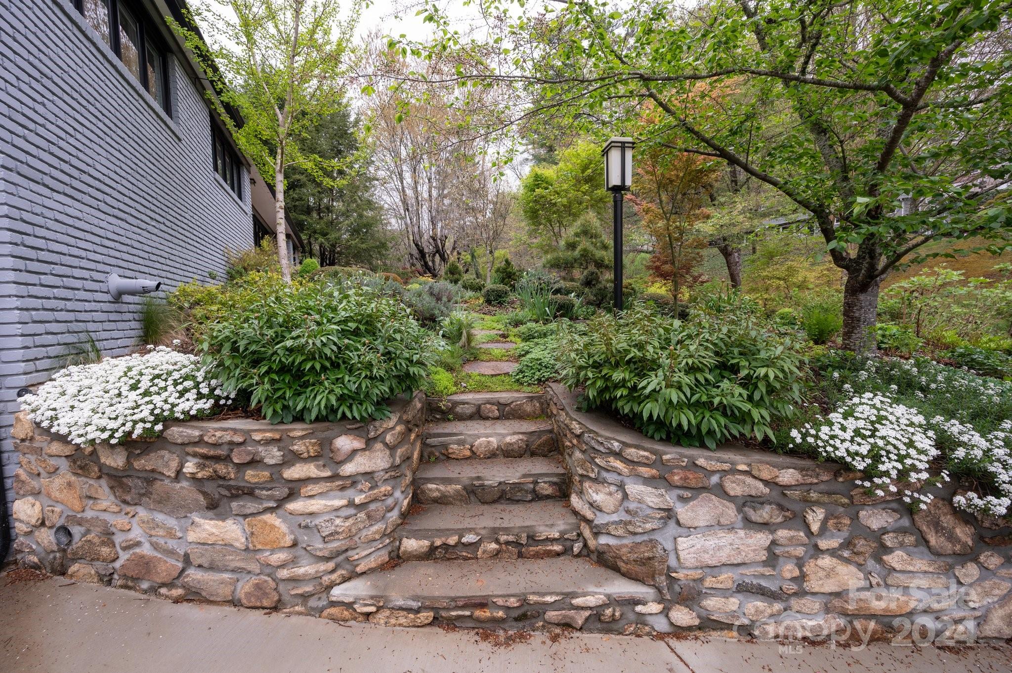 24 Maplewood Road Asheville, NC 28804 - Photo 32 of 38 a view of a pathway with a pathway