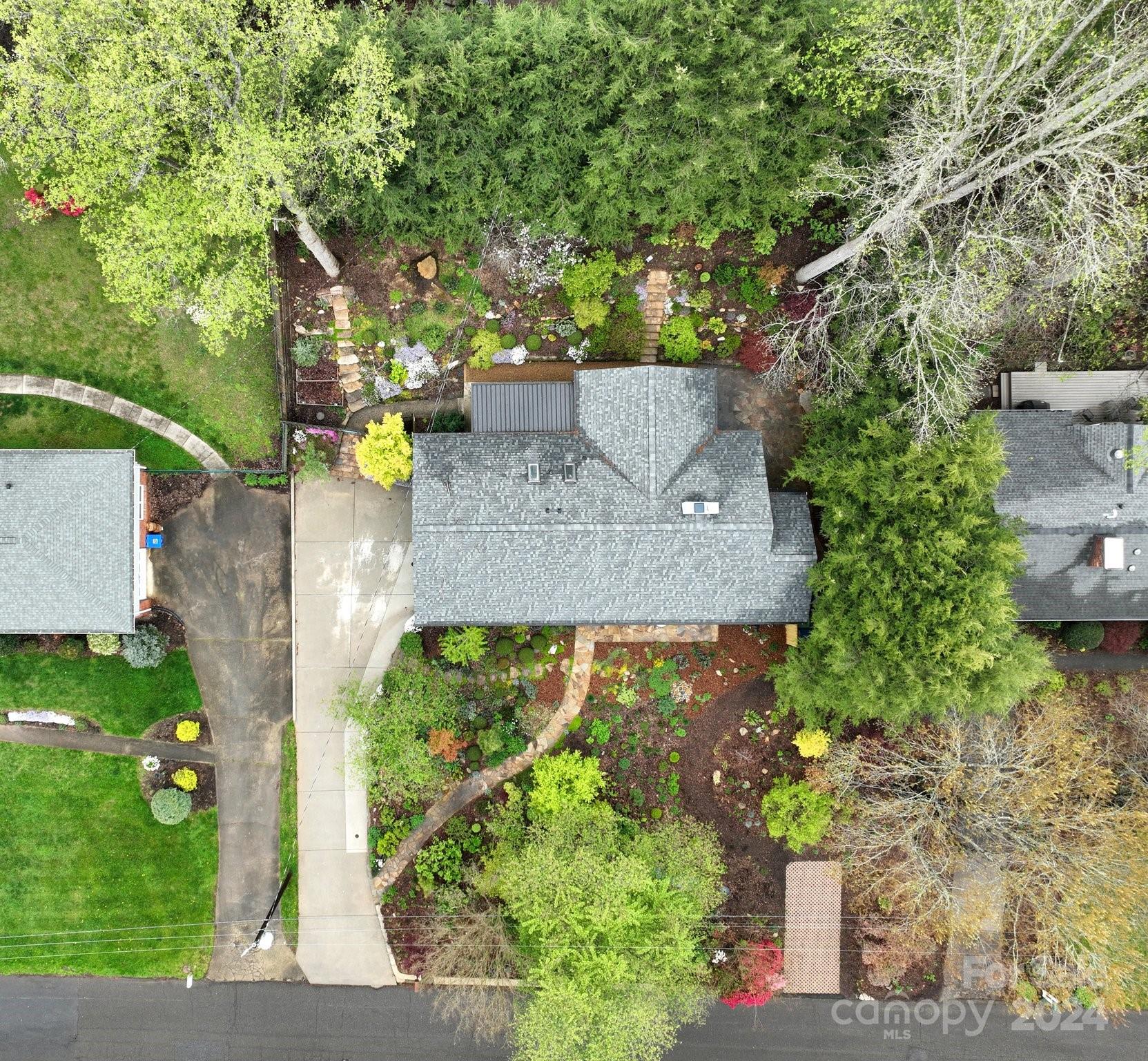 24 Maplewood Road Asheville, NC 28804 - Photo 37 of 38 an aerial view of a house with a yard