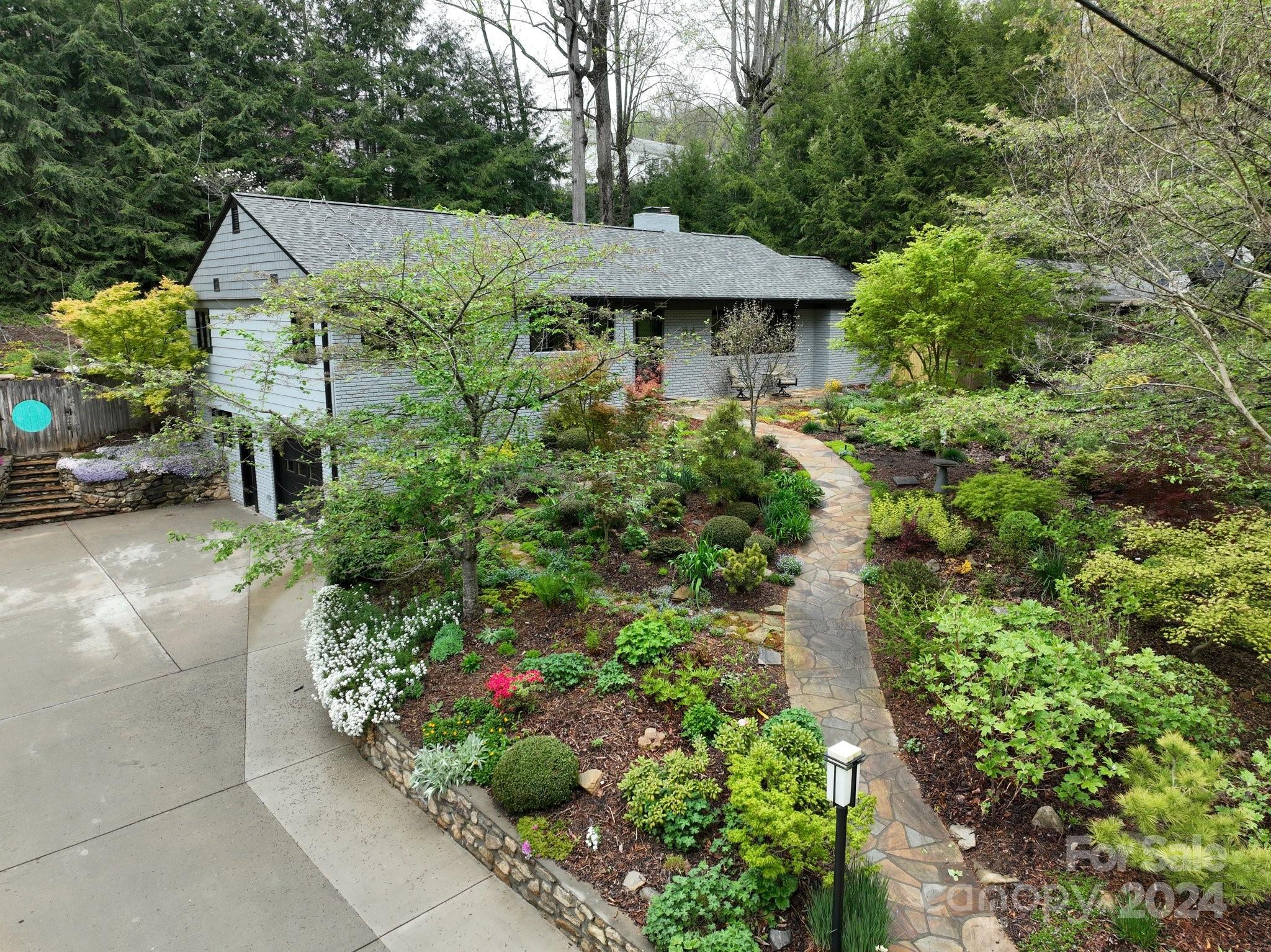 24 Maplewood Road Asheville, NC 28804 - Photo 38 of 38 a view of a house with a yard and garden