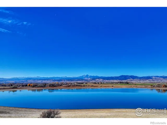 a swimming pool with wooden fence
