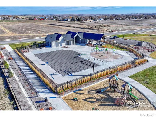 an aerial view of residential house with outdoor space