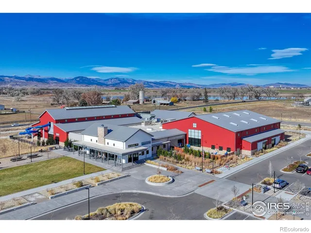 a view of a street with an ocean
