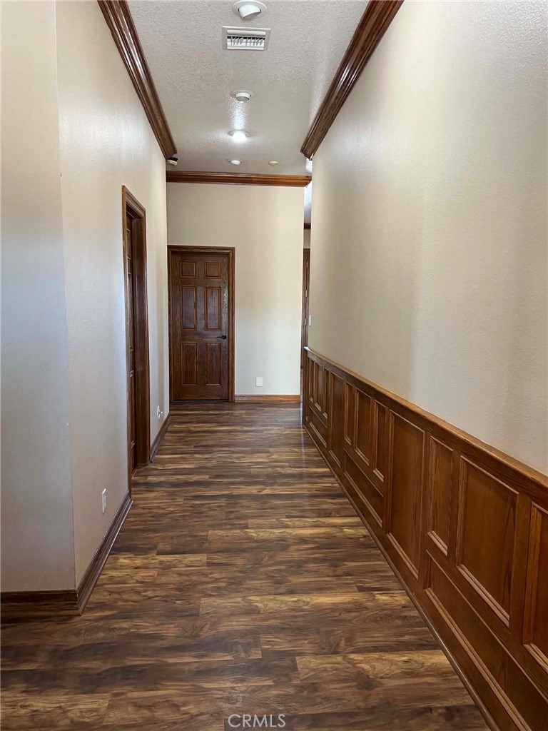 9126 Kittering Road Oak Hills, CA 92344 - Photo 32 of 47 hallway leading to bathroom