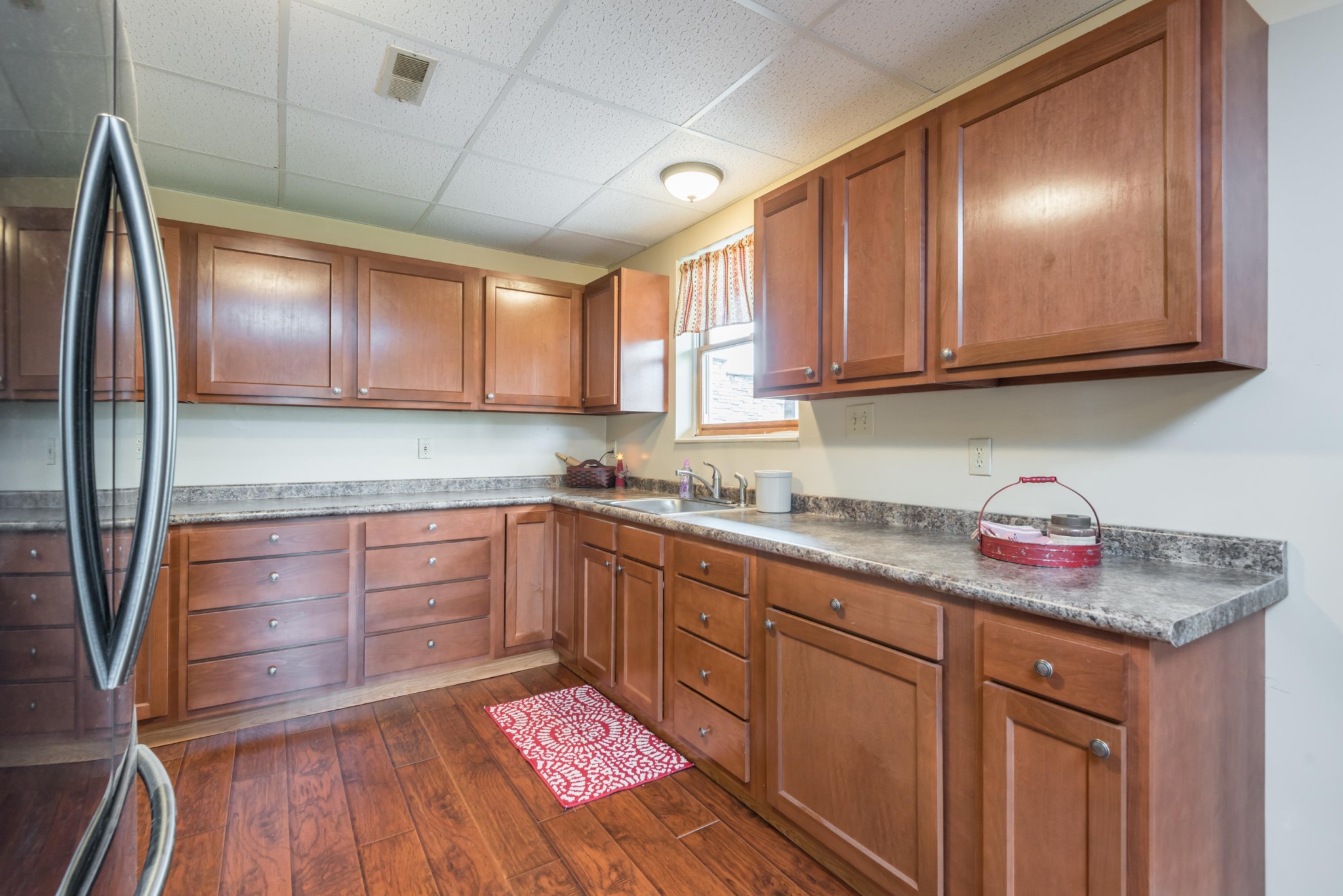 1521 Blockhouse Road Maryville, TN 37803 - Photo 22 of 40 a kitchen with stainless steel appliances granite countertop a sink stove and cabinets