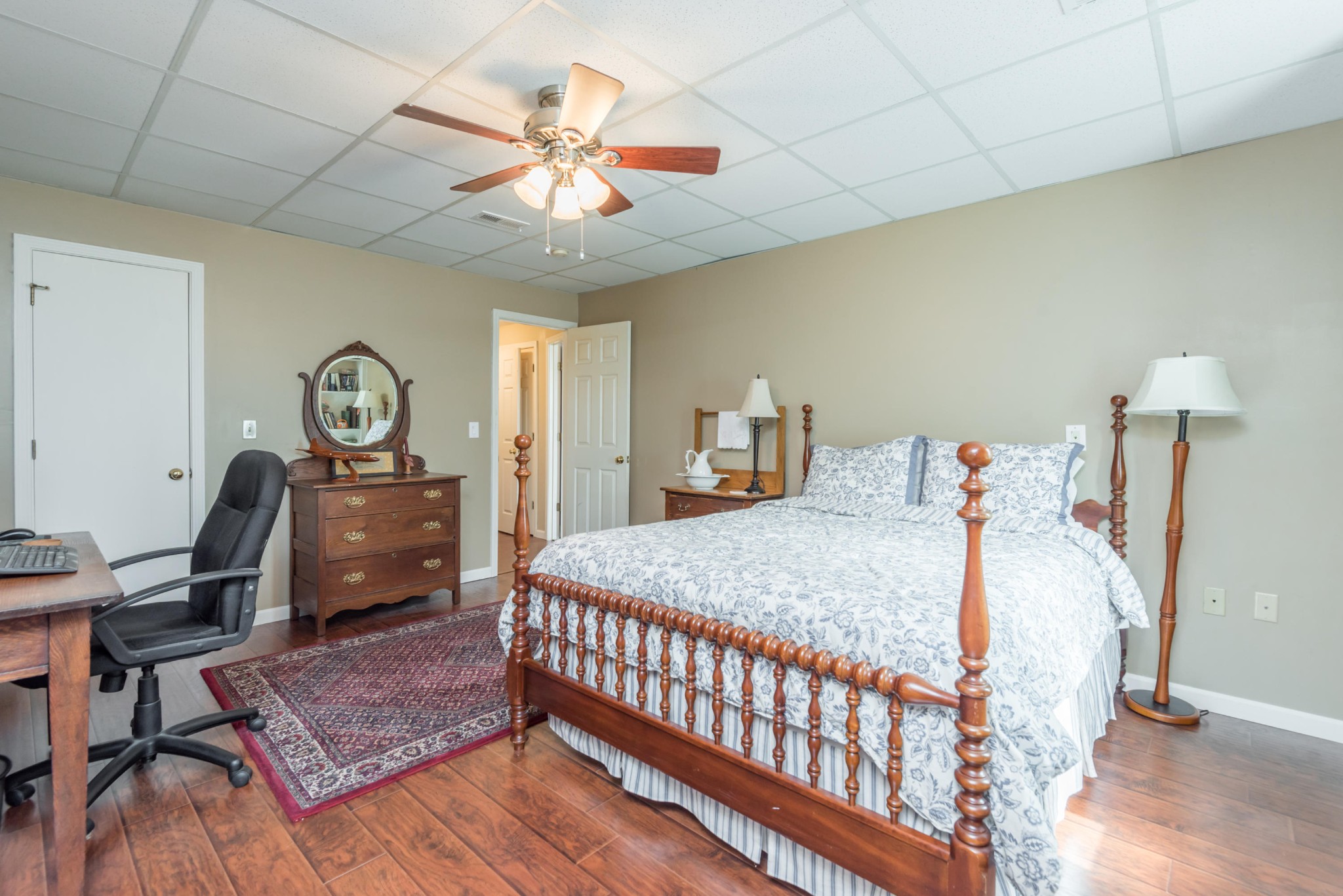 1521 Blockhouse Road Maryville, TN 37803 - Photo 24 of 40 a bedroom with a bed and wooden floor