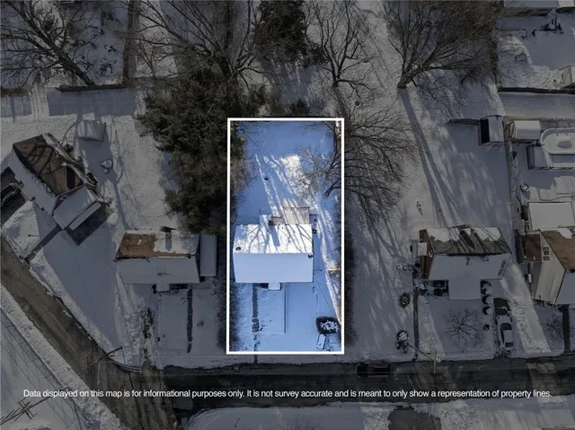 a view of a house with a tree
