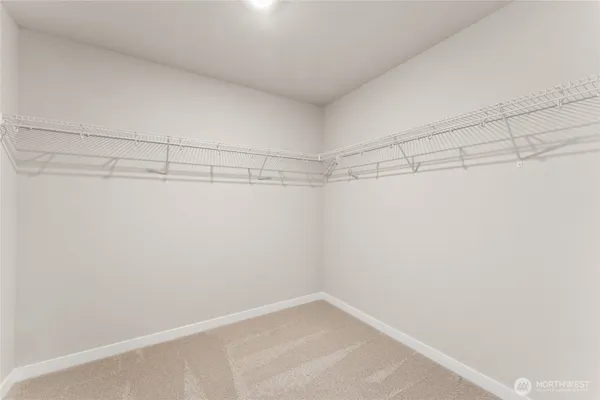 a view of a room with racks on the wall