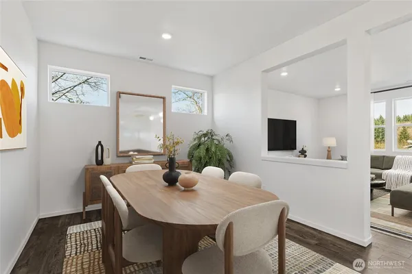 a view of a dining room with furniture