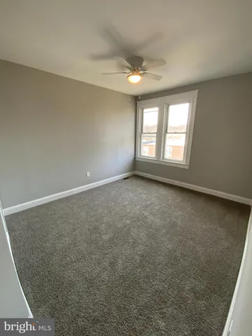 a bathroom with a bathtub and a toilet