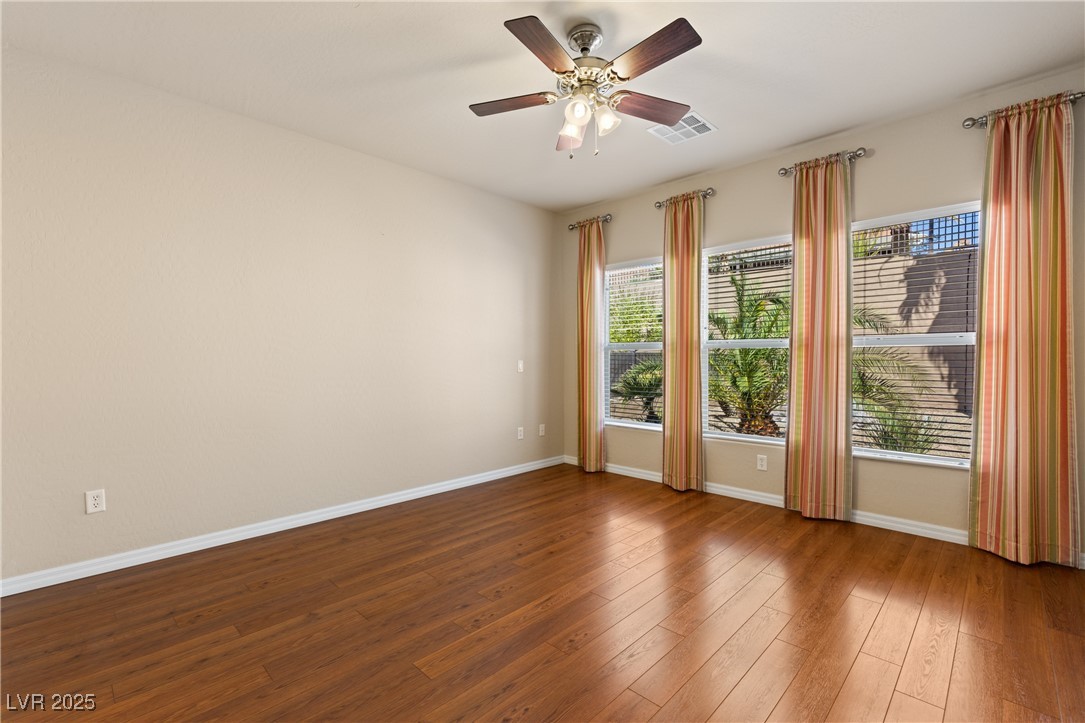 1551 Watchmans Point Mesquite, NV 89034 - Photo 29 of 62 Spare room featuring hardwood / wood-style flooring and ceiling fan