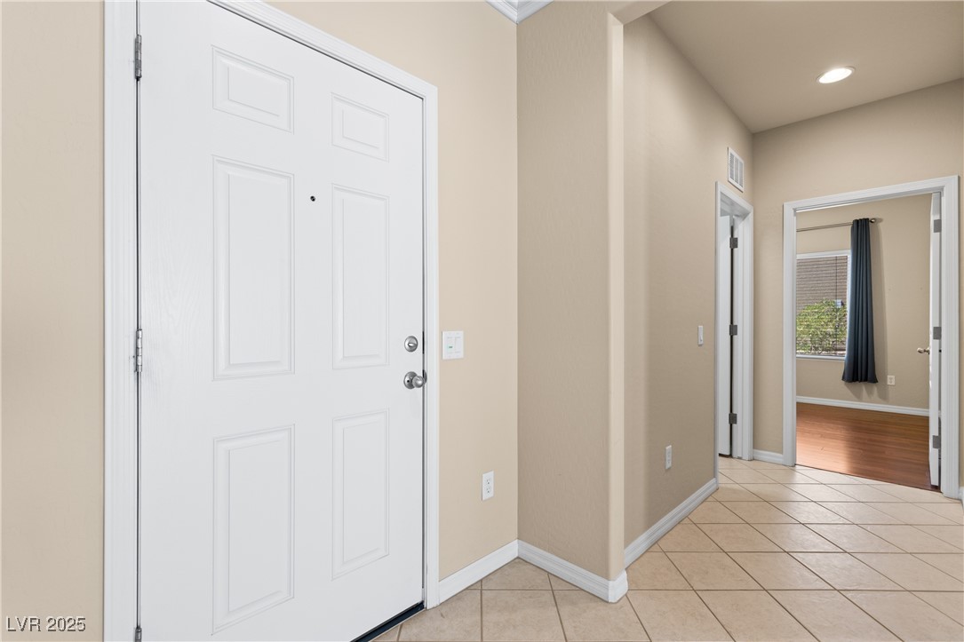 1551 Watchmans Point Mesquite, NV 89034 - Photo 7 of 62 Entrance foyer featuring light tile patterned flooring and recessed lighting